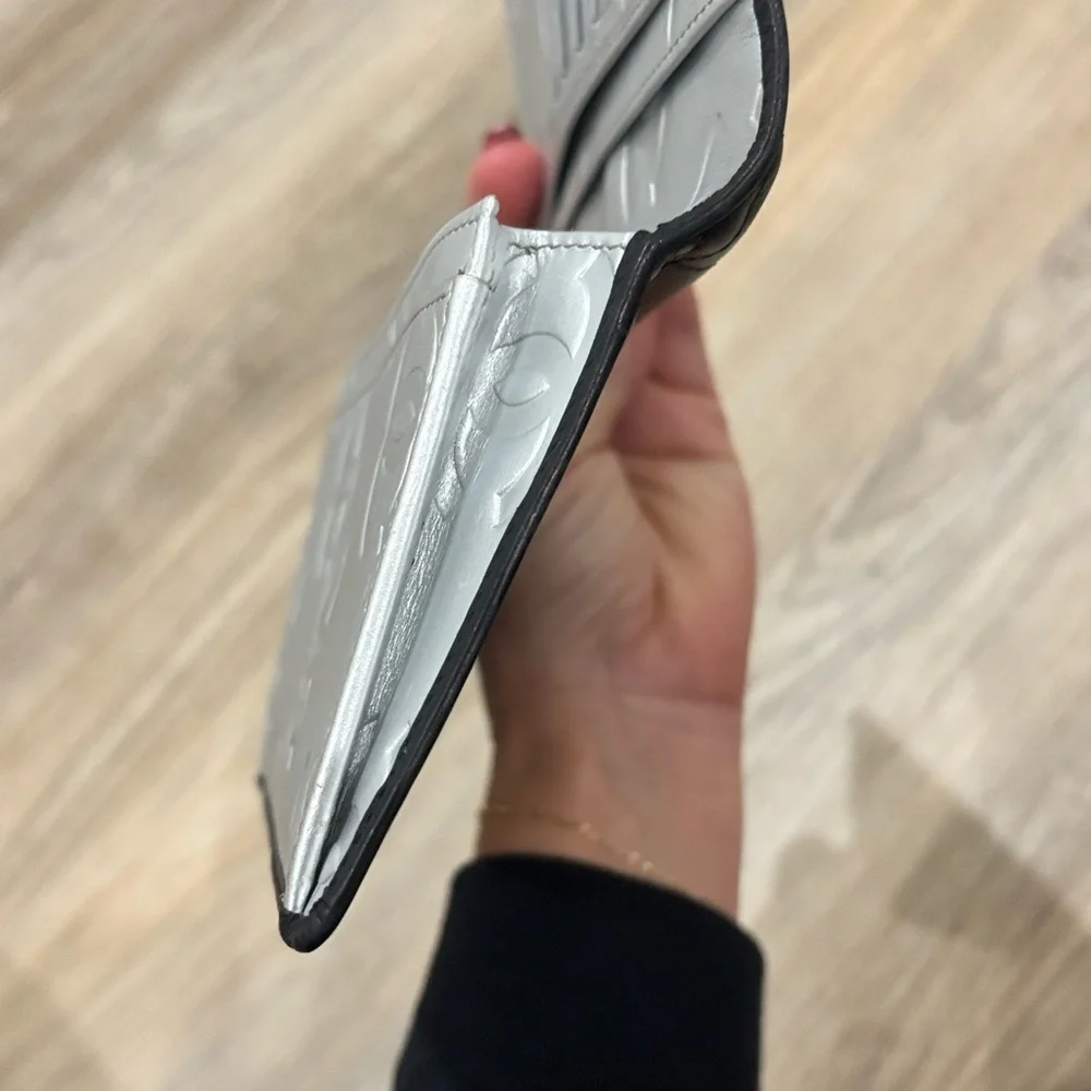CHANEL Black and Silver Quilted Wallet
